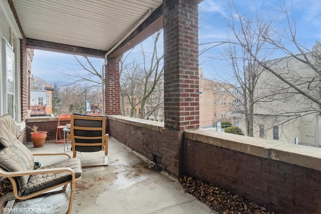 balcony featuring a sunroom