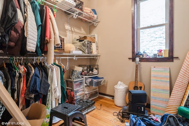 spacious closet with wood finished floors