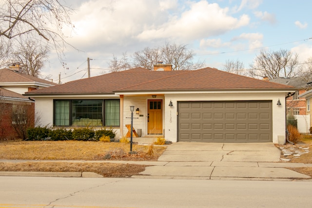 ranch-style house with driveway, a shingled roof, a chimney, and an attached garage