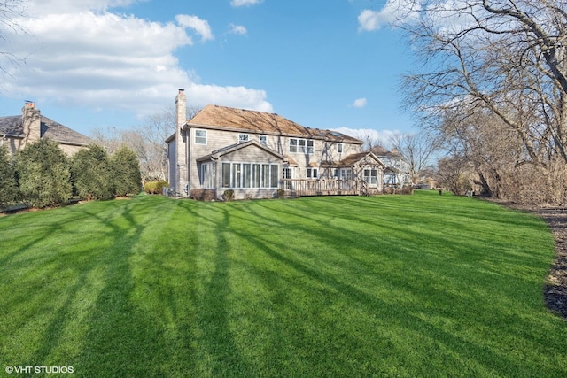 view of yard featuring a wooden deck