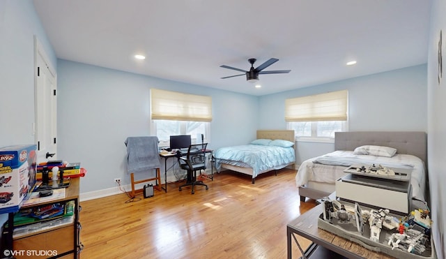 bedroom featuring light wood-type flooring, ceiling fan, baseboards, and recessed lighting