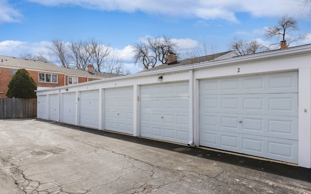 garage with fence