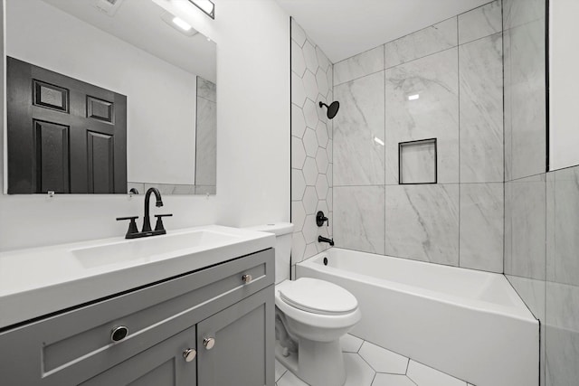 bathroom featuring shower / bath combination, toilet, and vanity