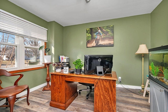 office area featuring wood finished floors and baseboards