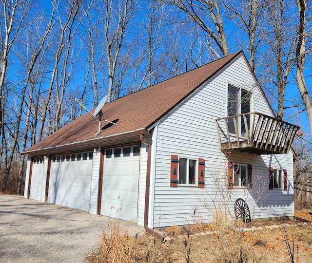 view of home's exterior featuring a balcony