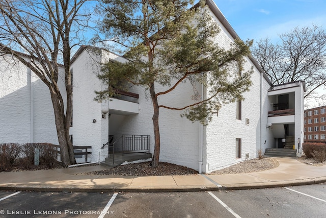 exterior space featuring uncovered parking