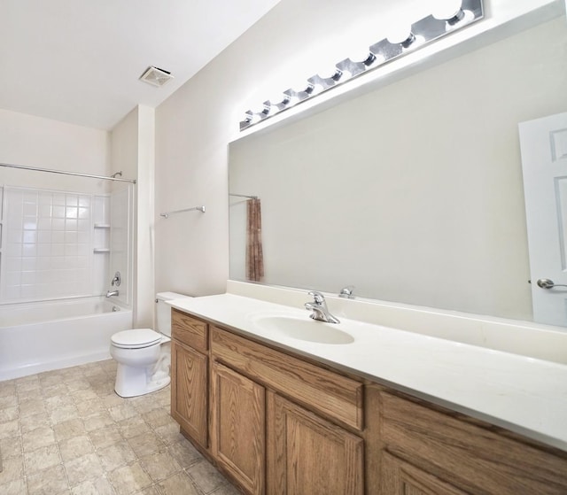 full bath featuring toilet, visible vents, tub / shower combination, and vanity