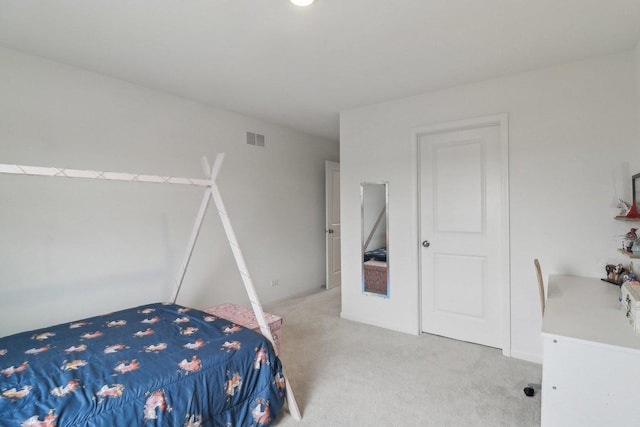 bedroom with carpet and visible vents