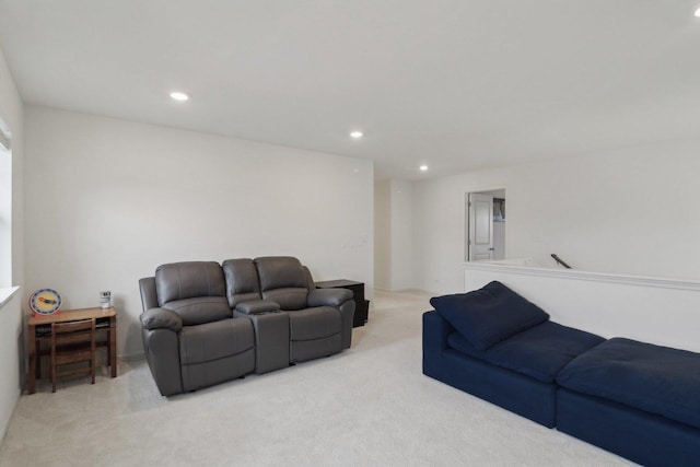 living room with light carpet and recessed lighting