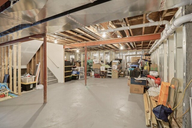 unfinished basement with stairway