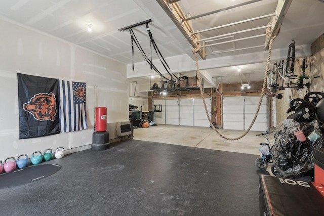 garage featuring heating unit