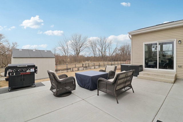 view of patio / terrace with entry steps, an outdoor hangout area, a grill, an outdoor structure, and a shed