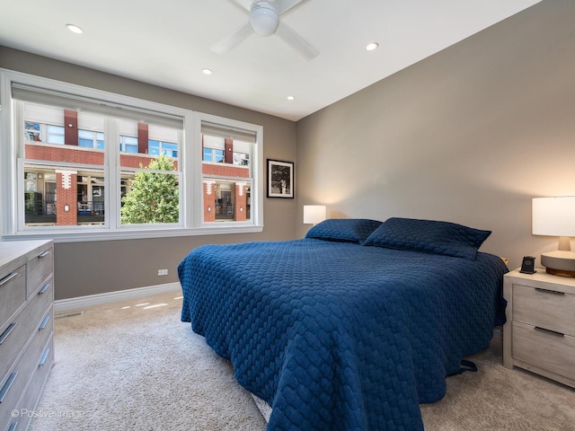 bedroom featuring recessed lighting, visible vents, a ceiling fan, light carpet, and baseboards