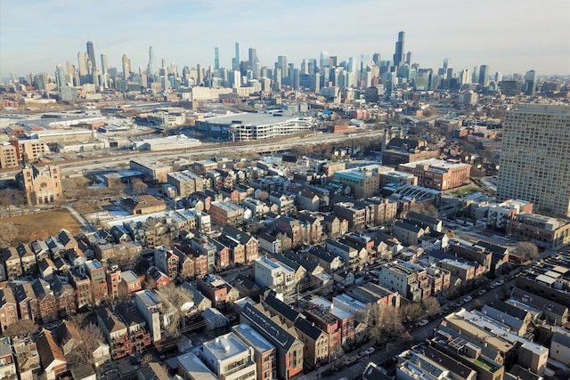 birds eye view of property with a view of city