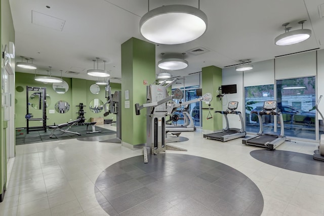 workout area featuring visible vents