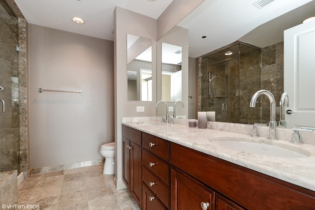 full bathroom featuring baseboards, double vanity, a sink, and a shower stall