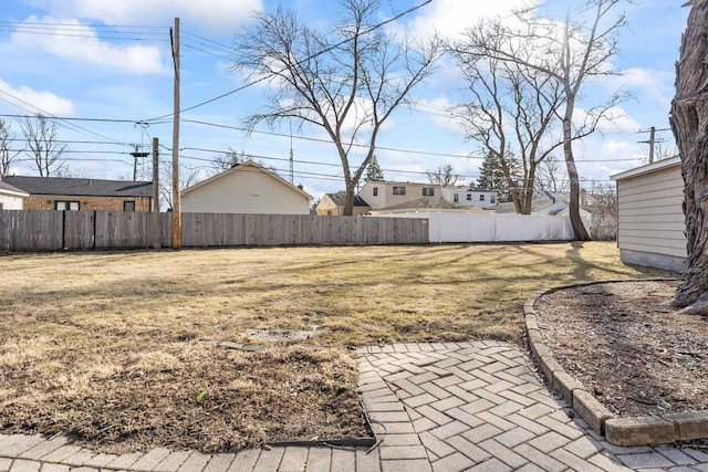 view of yard with a patio area and fence