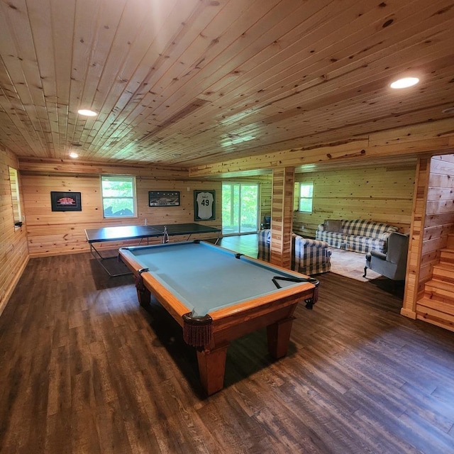 playroom featuring wood walls, wooden ceiling, and wood finished floors