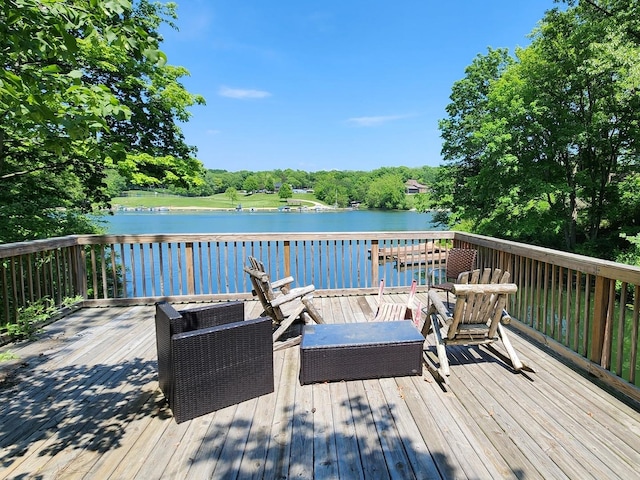 deck featuring a water view