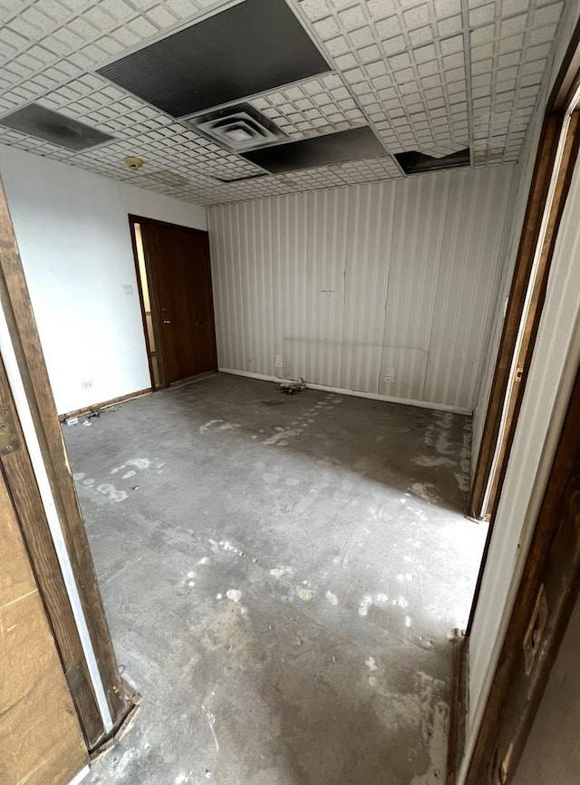 interior space with unfinished concrete floors