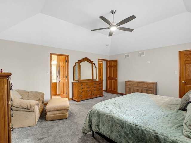 bedroom with lofted ceiling, carpet floors, and visible vents