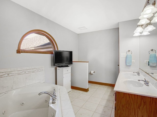 full bath with double vanity, a jetted tub, a sink, and baseboards