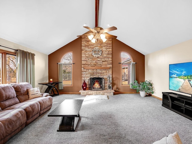 living area with high vaulted ceiling, a large fireplace, carpet floors, baseboards, and beam ceiling