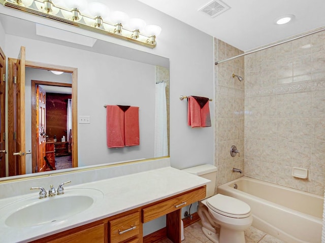 full bath featuring visible vents, toilet, tile patterned flooring, bathtub / shower combination, and vanity