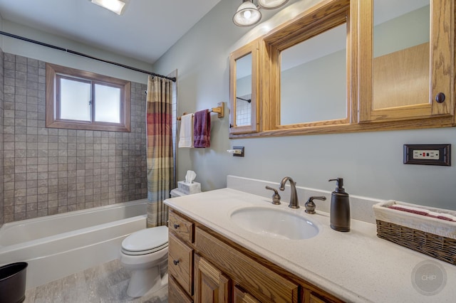 full bathroom with toilet, shower / bath combo with shower curtain, and vanity