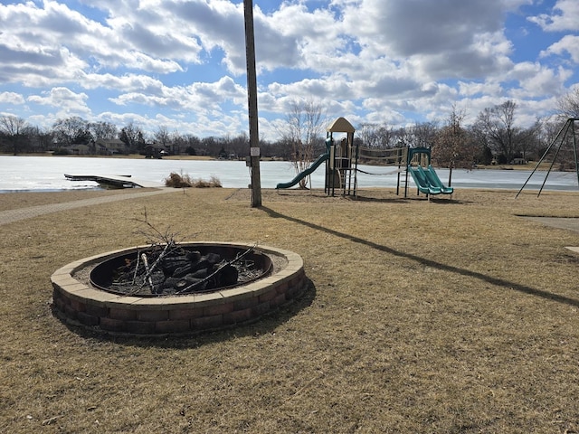 community playground with a fire pit