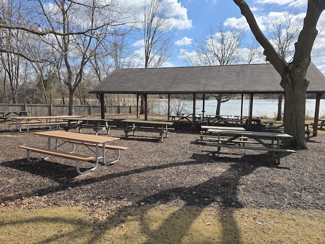 view of property's community with a gazebo and fence