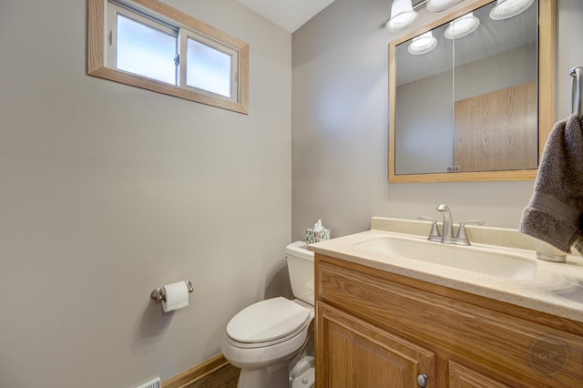 half bath with toilet and vanity