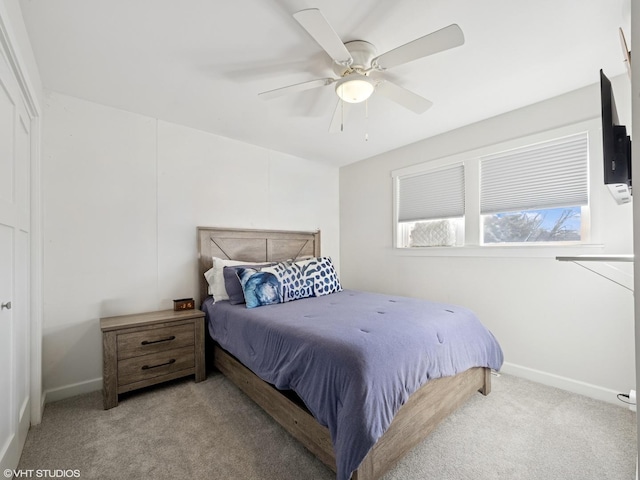 bedroom with baseboards, carpet floors, and ceiling fan