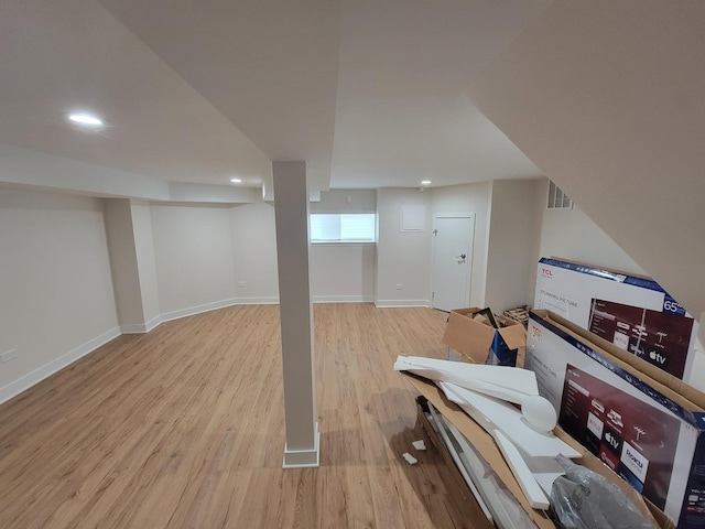 8240 S Wolcott Ave, Chicago, IL 60620 - below grade area featuring light wood-style floors and recessed lighting