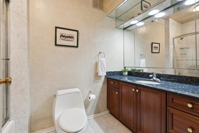 bathroom featuring toilet, visible vents, vanity, marble finish floor, and a shower with door