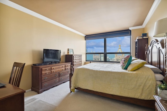 carpeted bedroom with crown molding