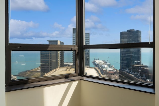 room details featuring a view of city and a water view