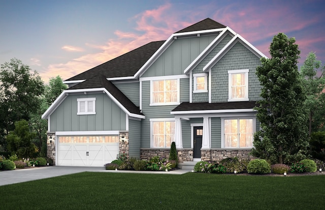 craftsman-style home with concrete driveway, stone siding, board and batten siding, and a yard