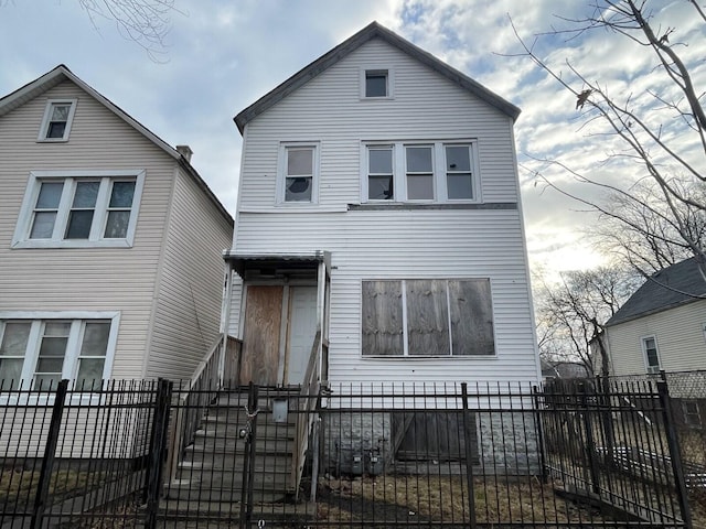 view of front of property with a fenced front yard