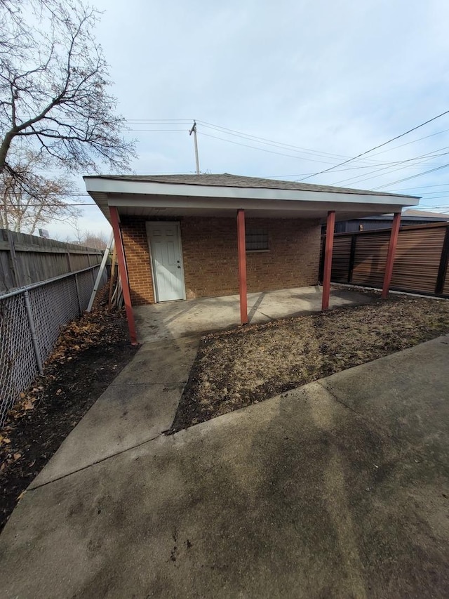 garage featuring fence