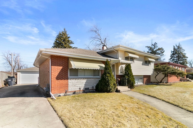 tri-level home with an outbuilding, a front lawn, brick siding, and a chimney