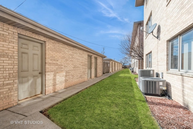 view of yard featuring central AC unit