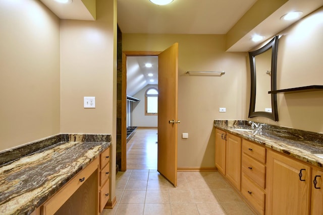 full bath with tile patterned flooring, vanity, and baseboards