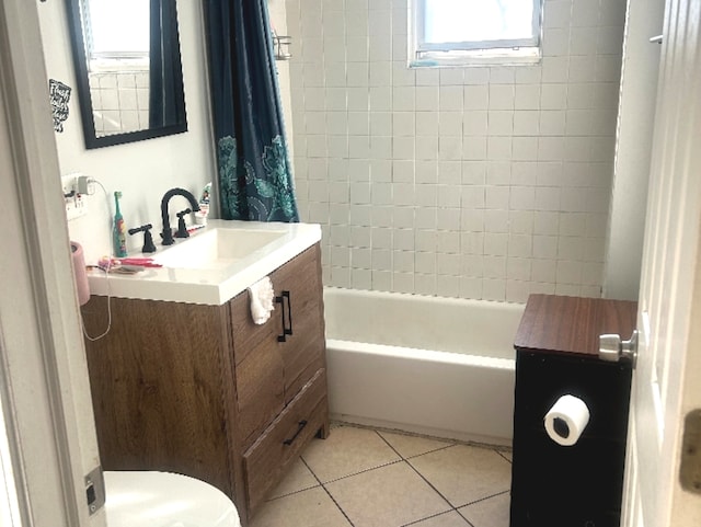 bathroom with toilet, shower / bathtub combination with curtain, vanity, and tile patterned floors