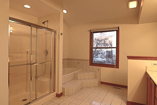 bathroom featuring a garden tub, tile patterned flooring, vanity, visible vents, and a stall shower