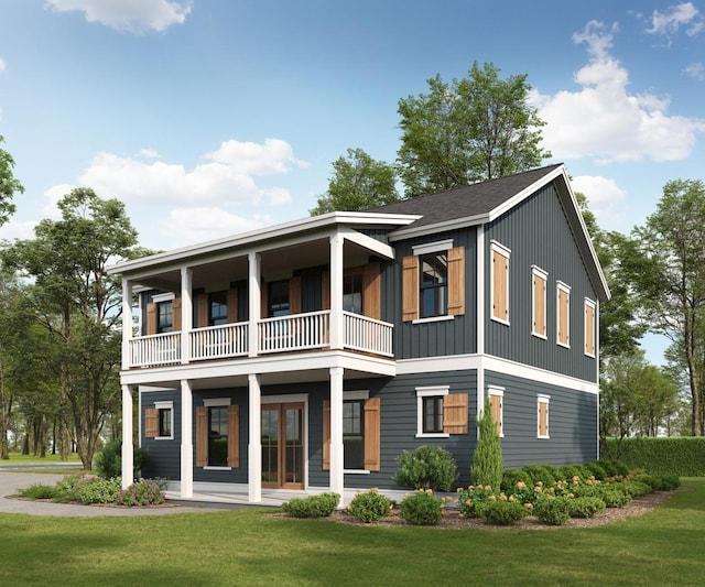 view of front of home featuring board and batten siding, a balcony, and a front lawn