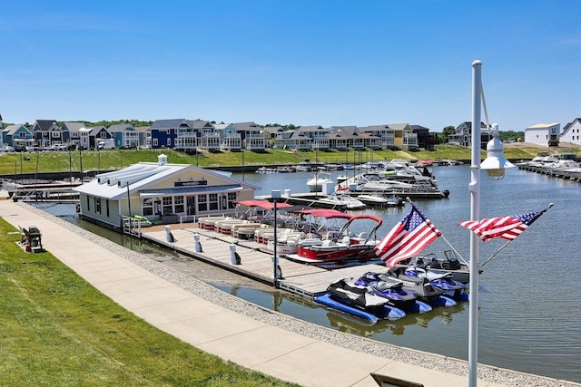 dock area featuring a residential view and a water view