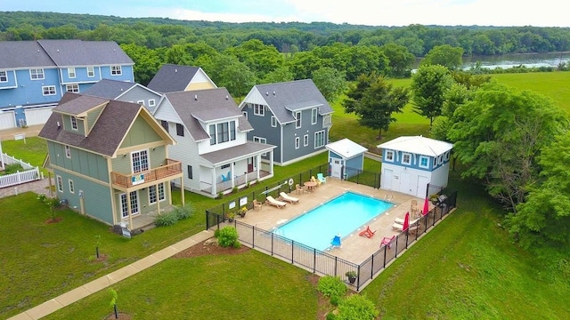 drone / aerial view with a view of trees