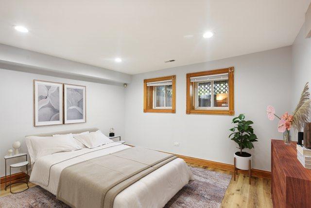 bedroom featuring recessed lighting, baseboards, and wood finished floors