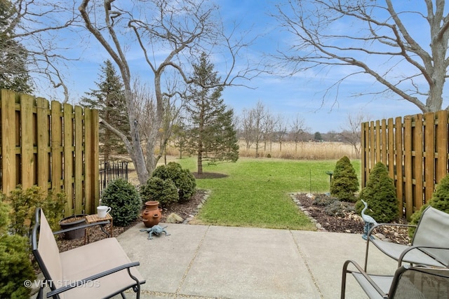 view of patio / terrace featuring fence